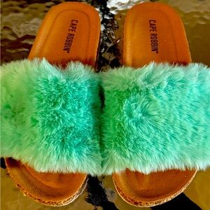 Mint green fuzzy slides